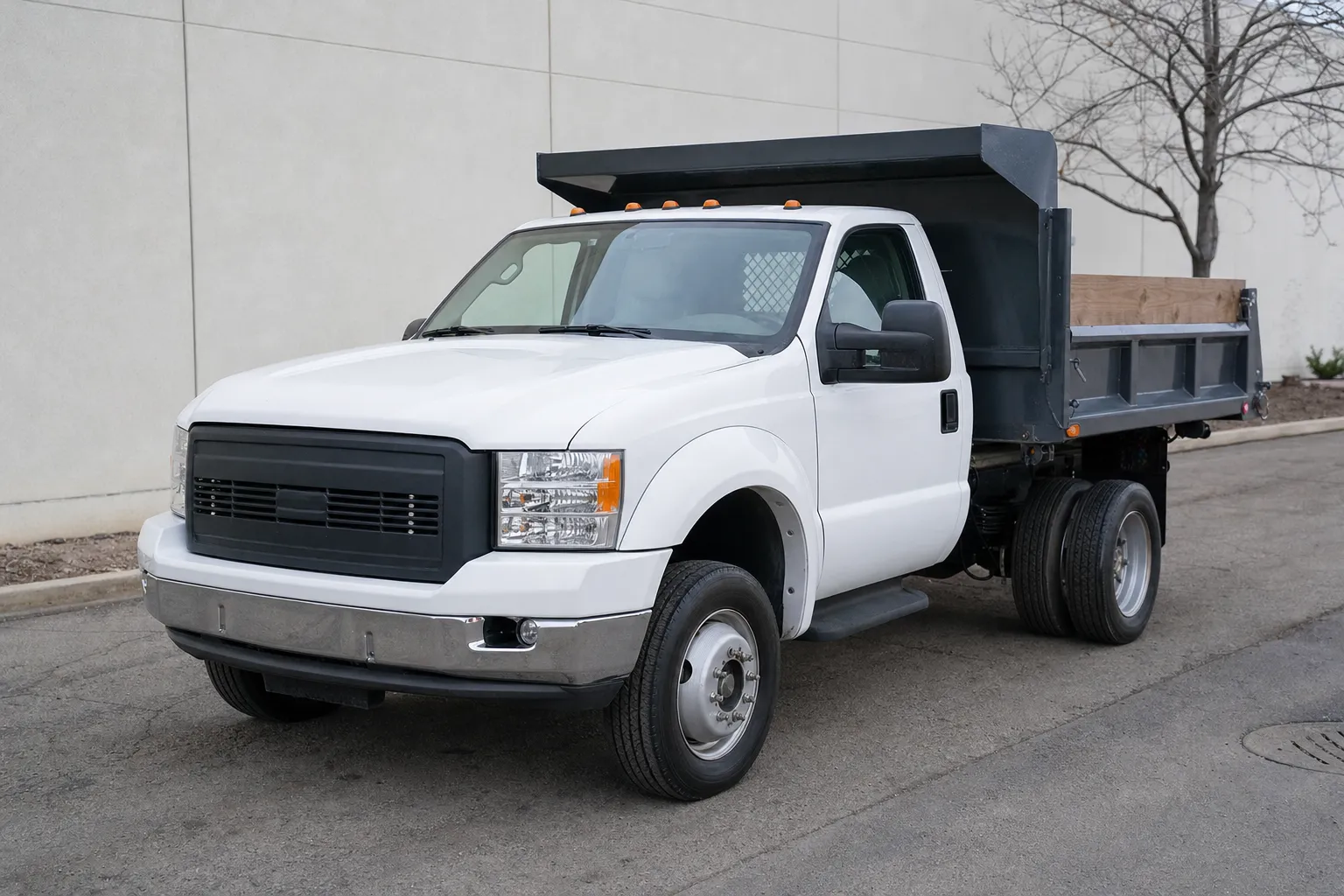White one-ton dump truck