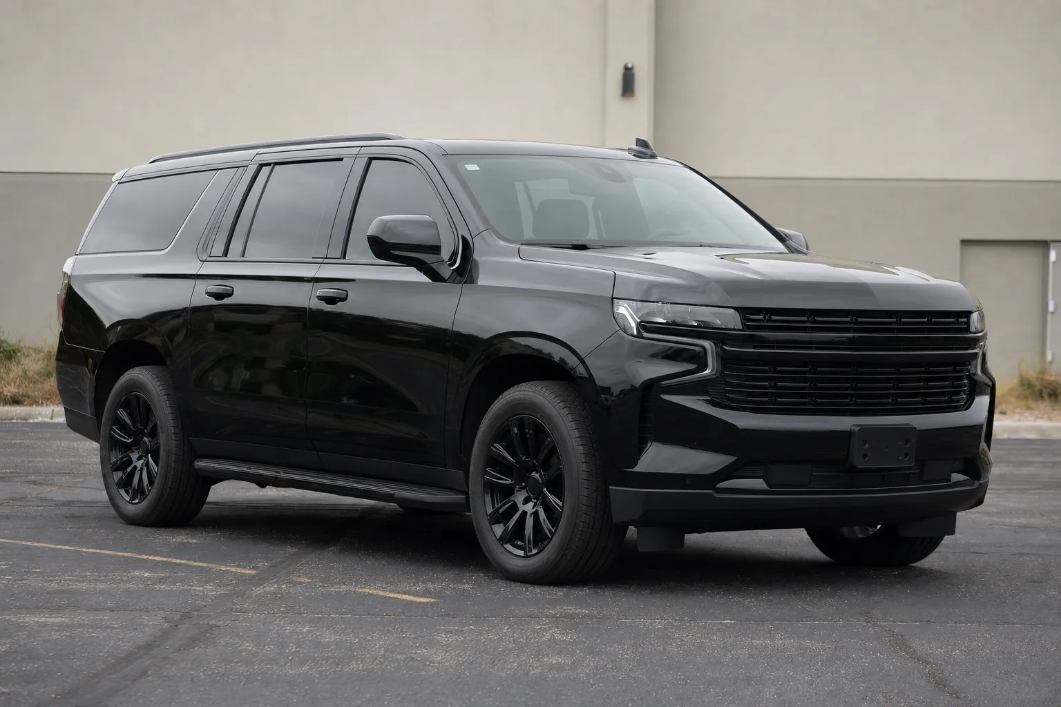 Black full-size livery SUV